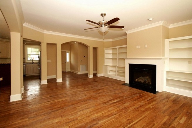 Wall paint ideas for living room with wood parquet flooring