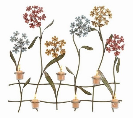 Outdoor wall art with candles