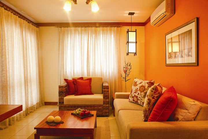 Decorate living room orange walls