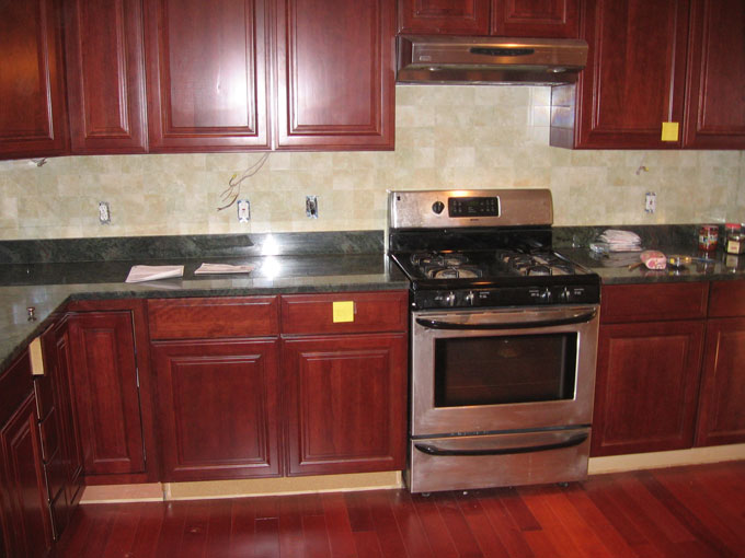 Cherry kitchen cabinets backsplash ideas