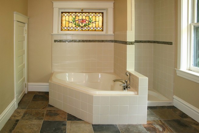 Subway tiles in bathroom with floor